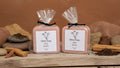 Two packages of tallow soap on a gray background